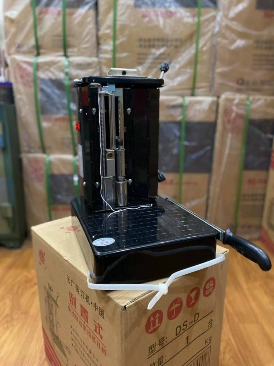 Máy đóng chứng từ luồn dây truyền thống